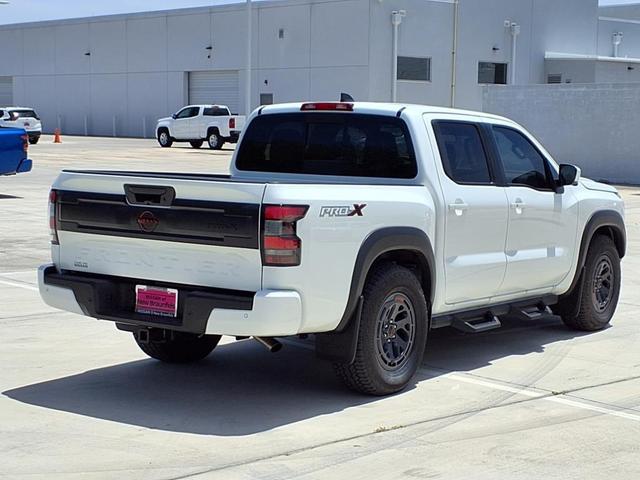 Photo of 2025 Glacier White Nissan Frontier