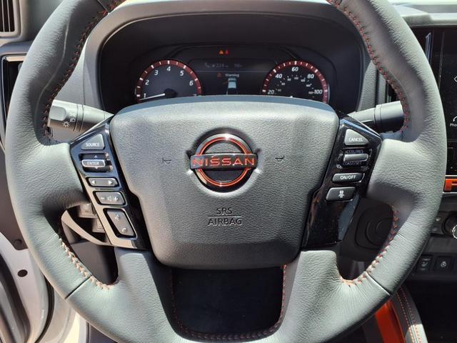 Photo of 2025 Glacier White Nissan Frontier