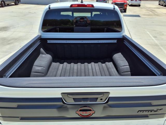 Photo of 2025 Glacier White Nissan Frontier