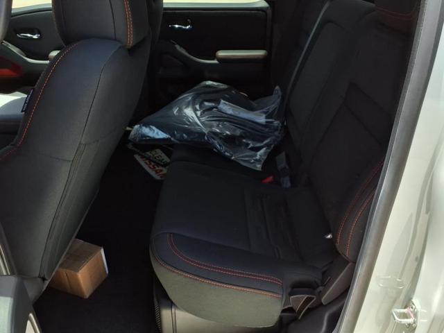 Photo of 2025 Glacier White Nissan Frontier