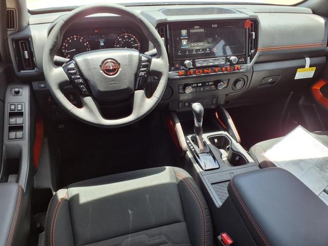 Photo of 2025 Glacier White Nissan Frontier