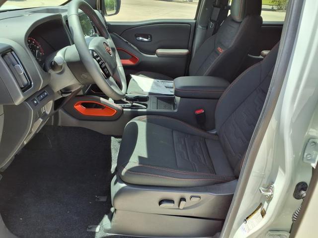 Photo of 2025 Glacier White Nissan Frontier
