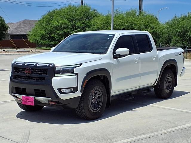 Photo of 2025 Glacier White Nissan Frontier