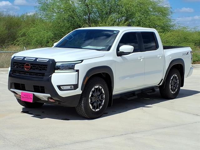 Photo of 2025 Glacier White Nissan Frontier