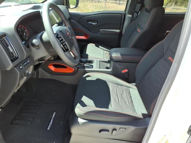 Photo of 2025 Glacier White Nissan Frontier