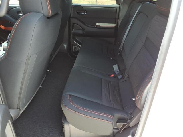 Photo of 2025 Glacier White Nissan Frontier