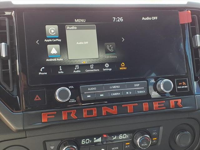 Photo of 2025 Glacier White Nissan Frontier