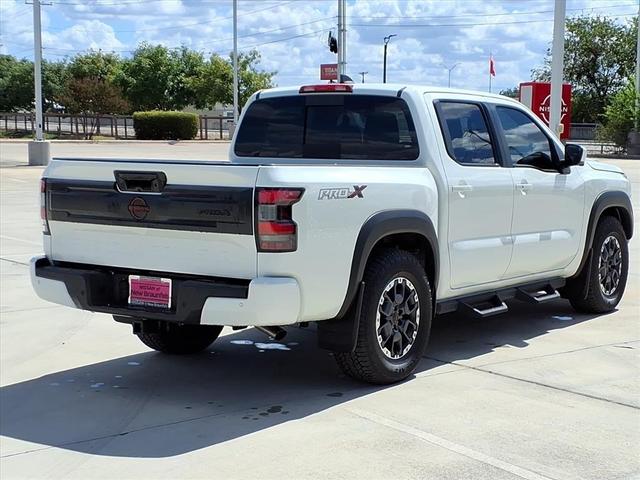 Photo of 2025 Glacier White Nissan Frontier