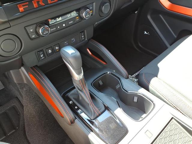 Photo of 2025 Glacier White Nissan Frontier