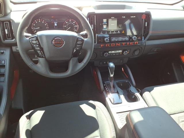 Photo of 2025 Glacier White Nissan Frontier