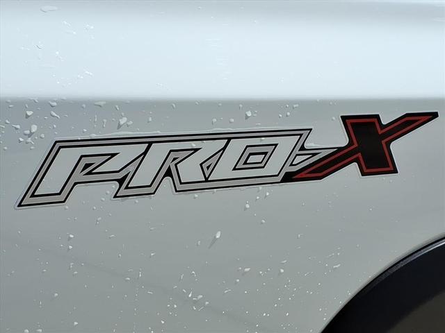 Photo of 2025 Glacier White Nissan Frontier