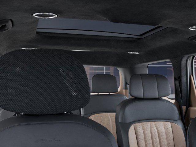 Photo of 2026 Wolf Gray/Ebony Black Roof Kia EV9