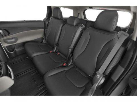 Photo of 2026 Ivory Silver Kia Carnival Hybrid