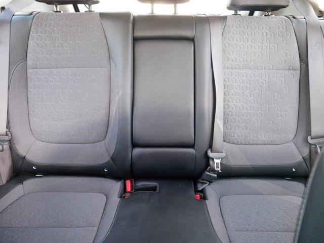 Photo of 2024 Clear White/Black Roof Kia Seltos