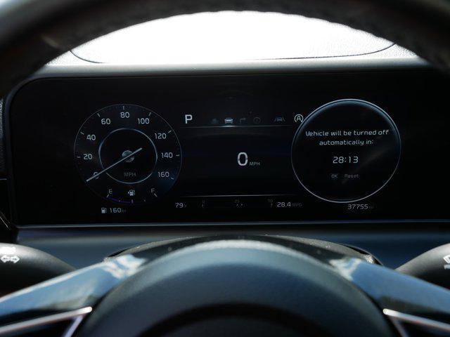 Photo of 2024 Clear White/Black Roof Kia Seltos