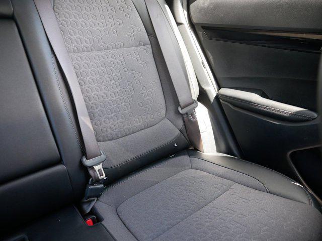 Photo of 2024 Clear White/Black Roof Kia Seltos