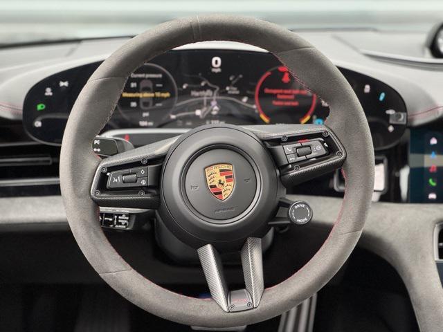 Photo of 2024 Jet Black Metallic Porsche Taycan