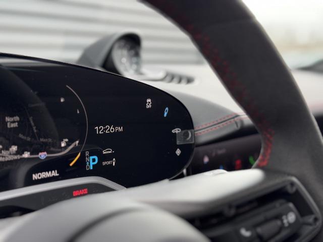 Photo of 2024 Jet Black Metallic Porsche Taycan