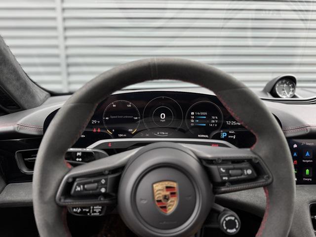 Photo of 2024 Jet Black Metallic Porsche Taycan