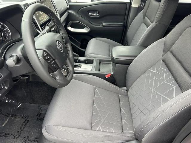 Photo of 2025 Glacier White Nissan Frontier