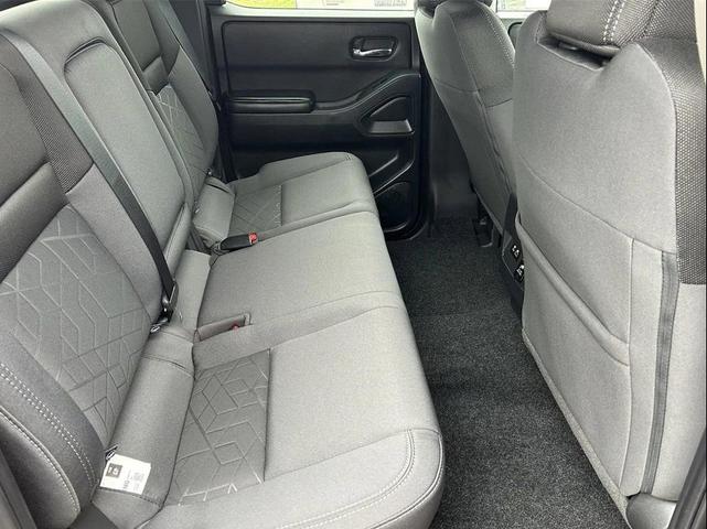 Photo of 2025 Glacier White Nissan Frontier