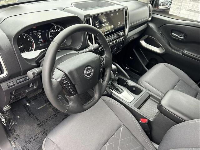 Photo of 2025 Glacier White Nissan Frontier