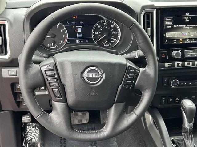 Photo of 2025 Glacier White Nissan Frontier