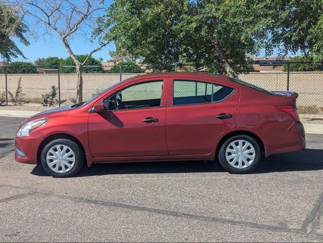 Photo of 2017 Cayenne Red Nissan Versa