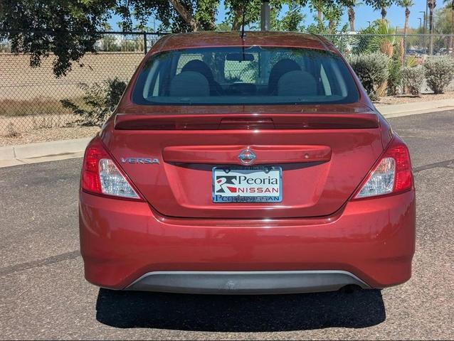 Photo of 2017 Cayenne Red Nissan Versa