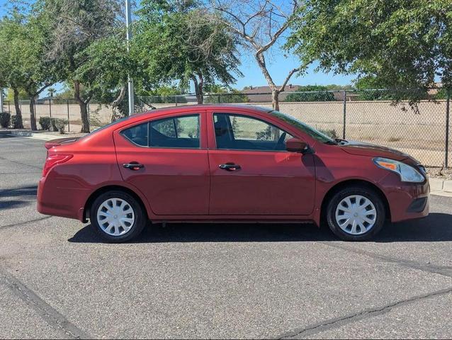 Photo of 2017 Cayenne Red Nissan Versa