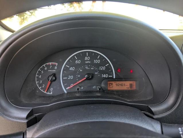 Photo of 2017 Cayenne Red Nissan Versa