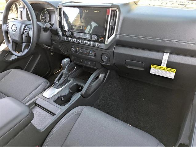 Photo of 2025 Glacier White Nissan Frontier