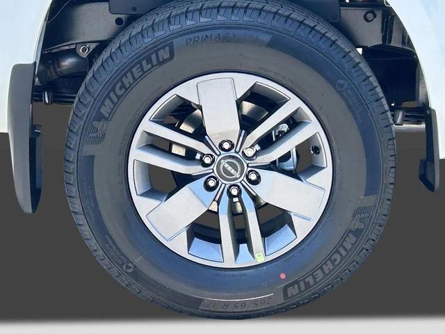 Photo of 2025 Glacier White Nissan Frontier
