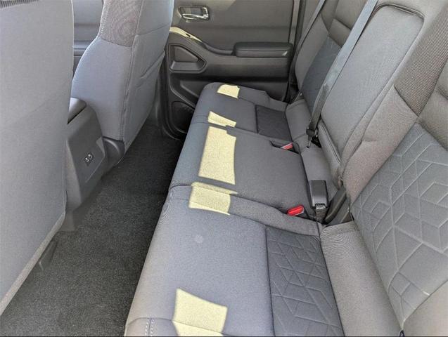 Photo of 2025 Glacier White Nissan Frontier