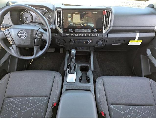 Photo of 2025 Glacier White Nissan Frontier