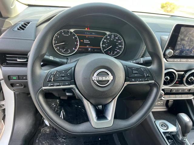 Photo of 2025 Aspen White Tricoat Nissan Sentra
