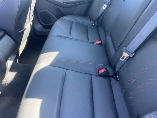 Photo of 2024 Pearl White Tricoat Nissan Altima