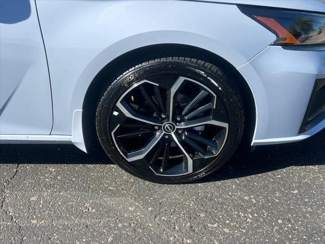 Photo of 2024 Pearl White Tricoat Nissan Altima