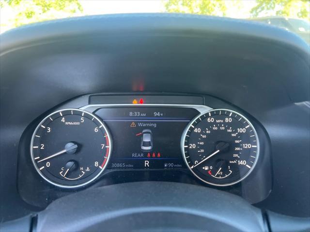 Photo of 2024 Pearl White Tricoat Nissan Altima