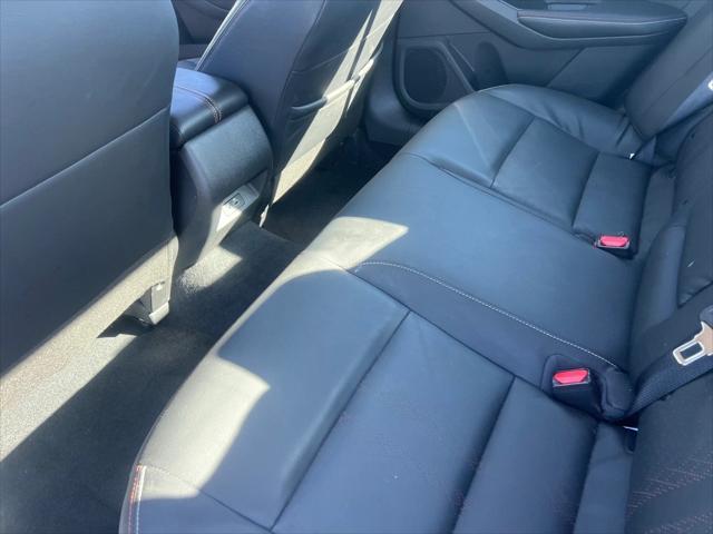 Photo of 2024 Pearl White Tricoat Nissan Altima