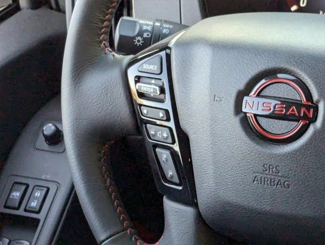 Photo of 2025 Glacier White Nissan Frontier