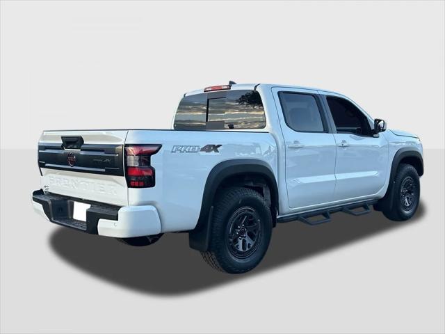 Photo of 2025 Glacier White Nissan Frontier