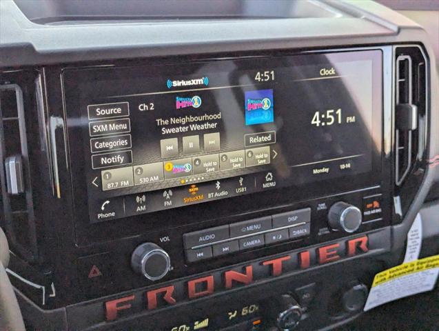 Photo of 2025 Glacier White Nissan Frontier