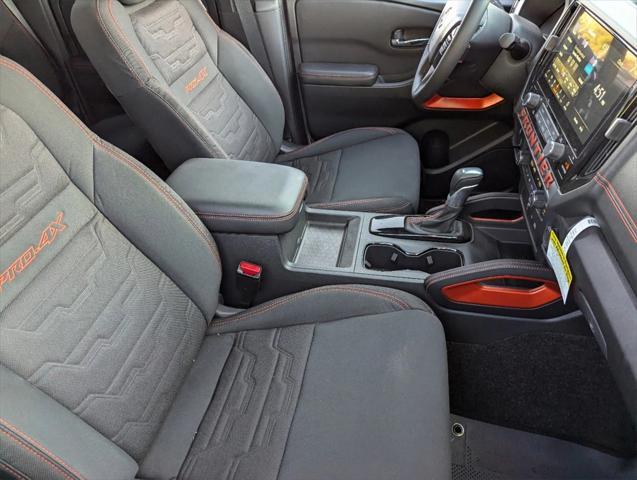 Photo of 2025 Glacier White Nissan Frontier