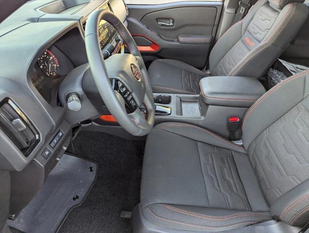 Photo of 2025 Glacier White Nissan Frontier