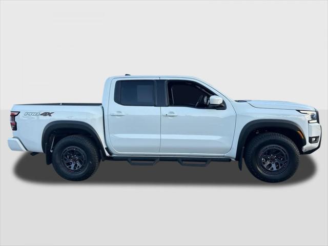 Photo of 2025 Glacier White Nissan Frontier