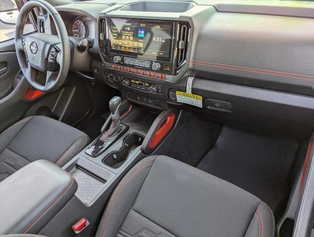 Photo of 2025 Glacier White Nissan Frontier