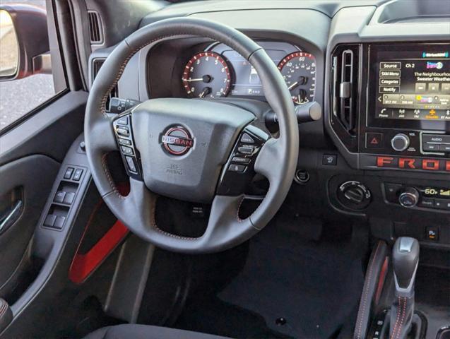 Photo of 2025 Glacier White Nissan Frontier