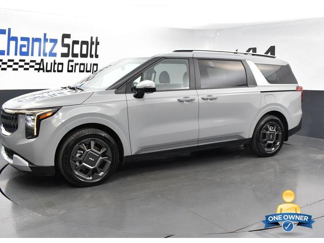 Photo of 2025 CERAMIC SILVER Kia Carnival Hybrid