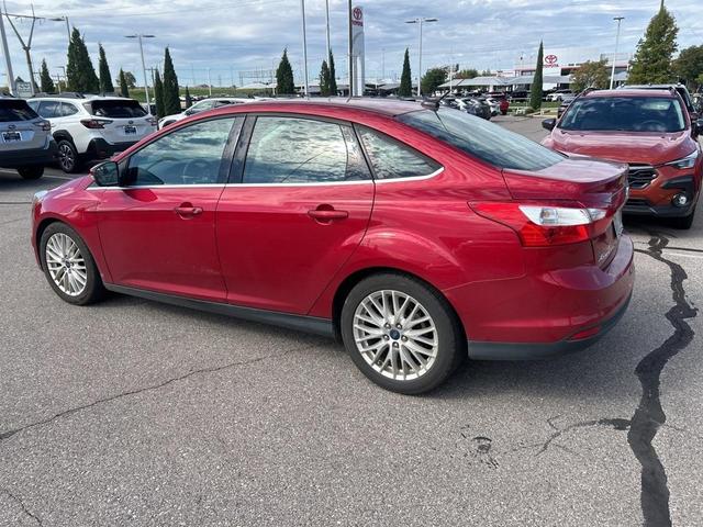 Photo of 2012 Red Candy Metallic Tinted Clearcoat Ford Focus